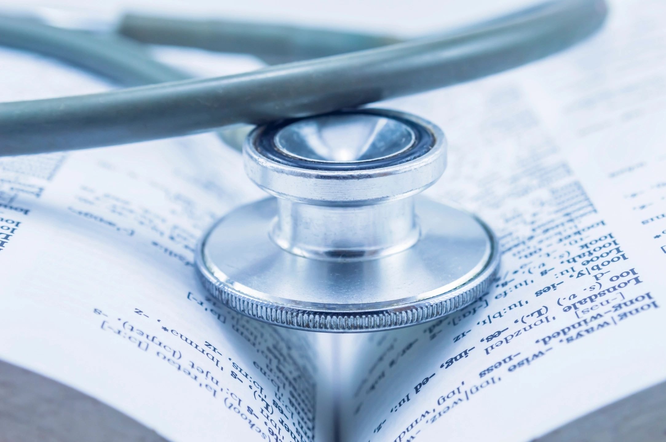 Stethoscope on a medical reference book